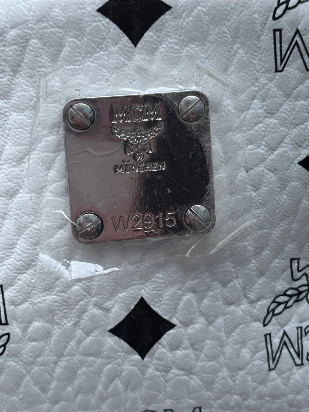 MCM White Visetos Mini Backpack with Black Logo Print and Silver Hardware